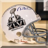 C11. Mini helmet signed by Tom Brady and Bill Belichick. 